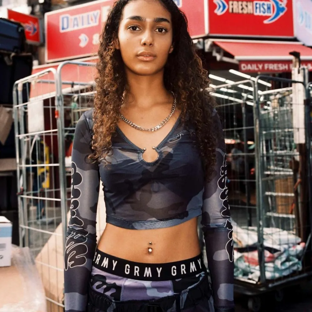 Grimey Top Tusker Temple Micro Mesh Girl Crop - Black | Fw23 Best